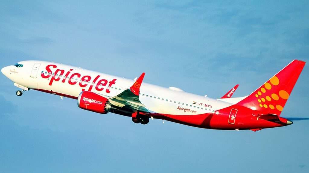 A SpiceJet Boeing 737 MAX climbs after takeoff.