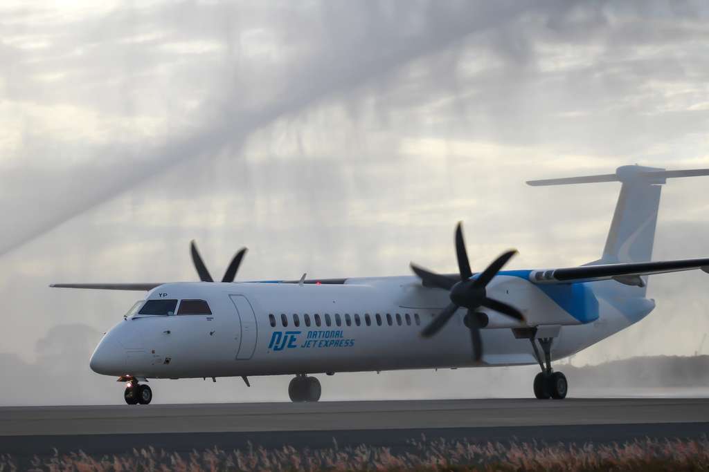 A National Jet Express aircraft receives a water cannon salute at Brisbane.