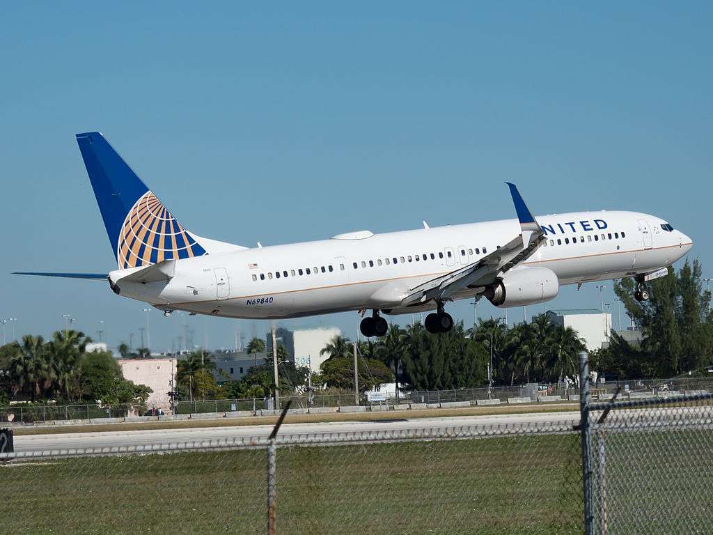 A United Airlines 737 lands in Miami.