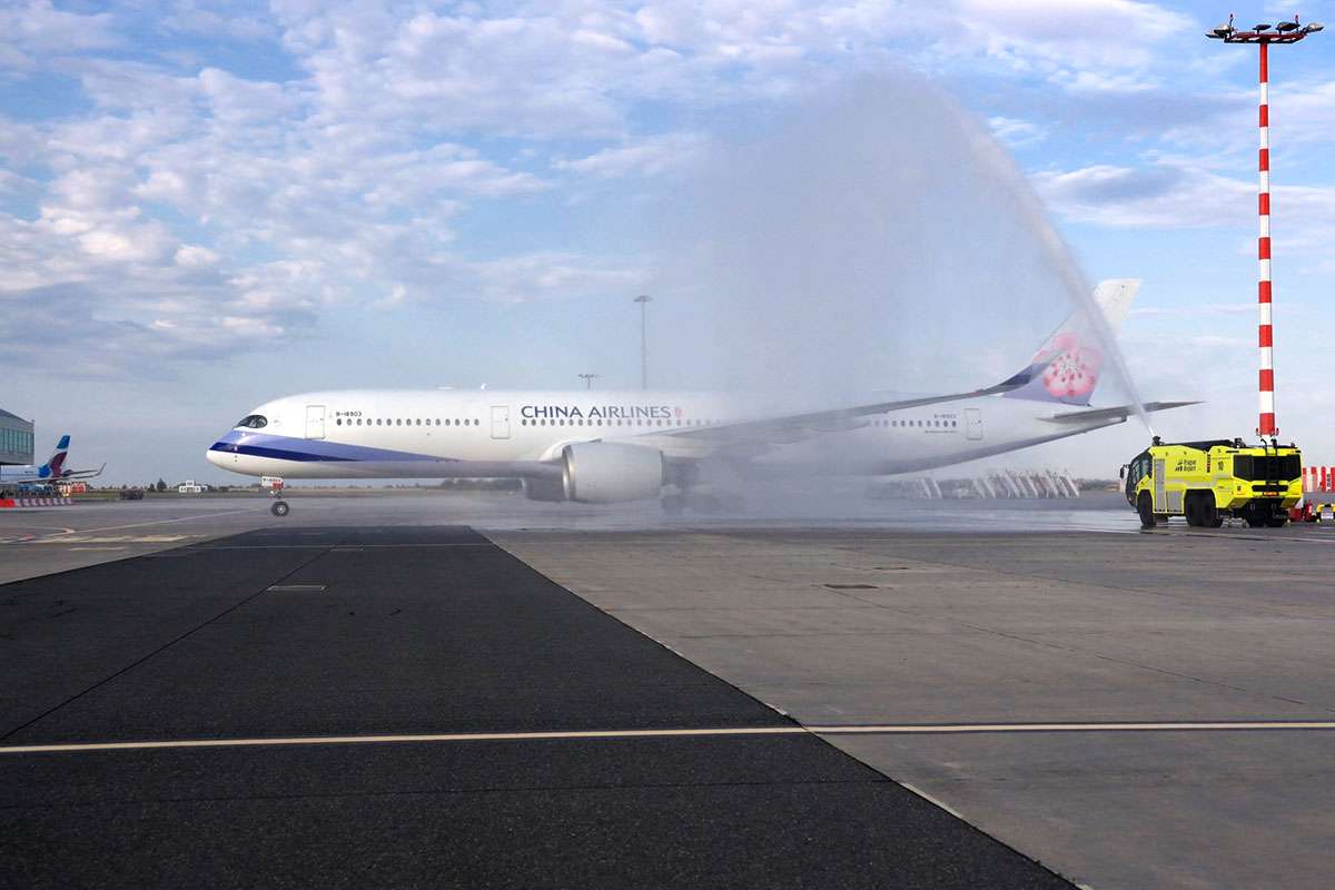 A China Airlines flight receives a water cannon salute on arrival at Prague.