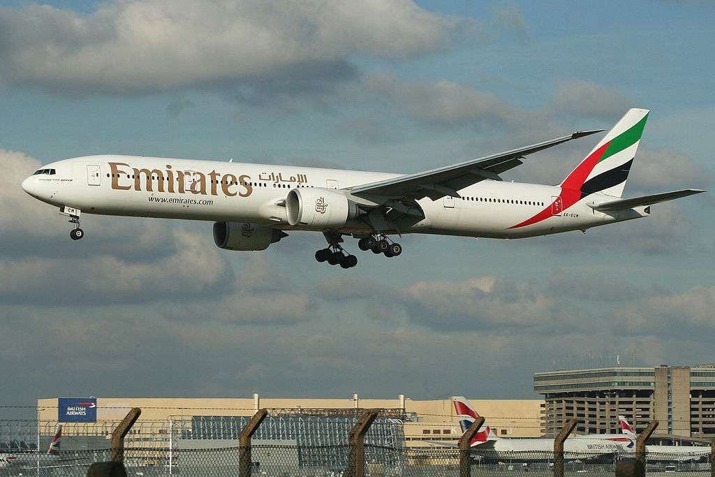 An Emirates Boeing 777 from Dubai lands at London Heathrow.
