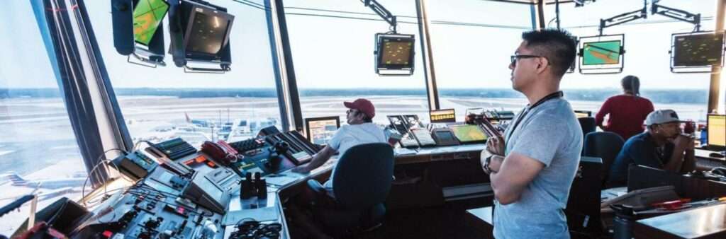 Air Traffic Controllers in airport control tower