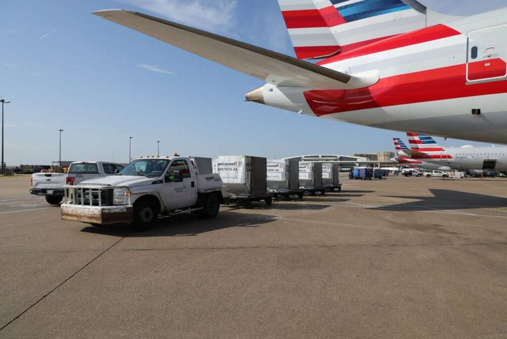 An American Airlines jet is loaded with supplies to assist in Maui wildfires relief efforts.