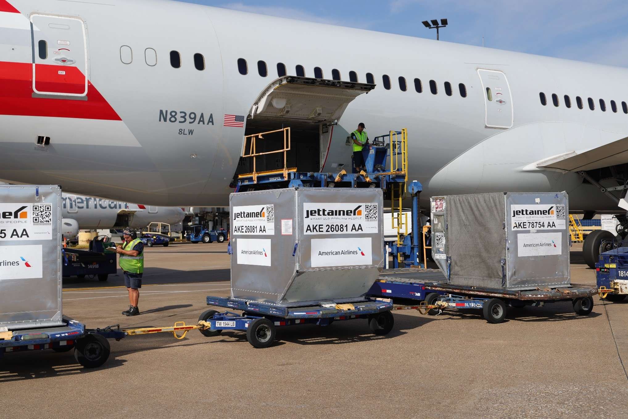 An American Airlines jet is loaded with supplies to assist in Maui wildfires.