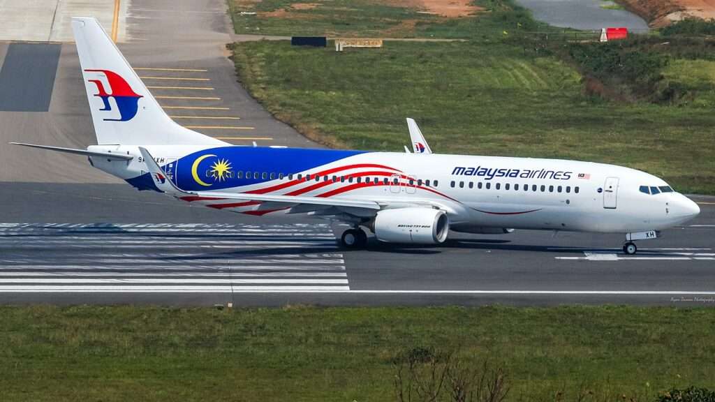 A Malaysian Airlines Boeing 737 enters the runway.