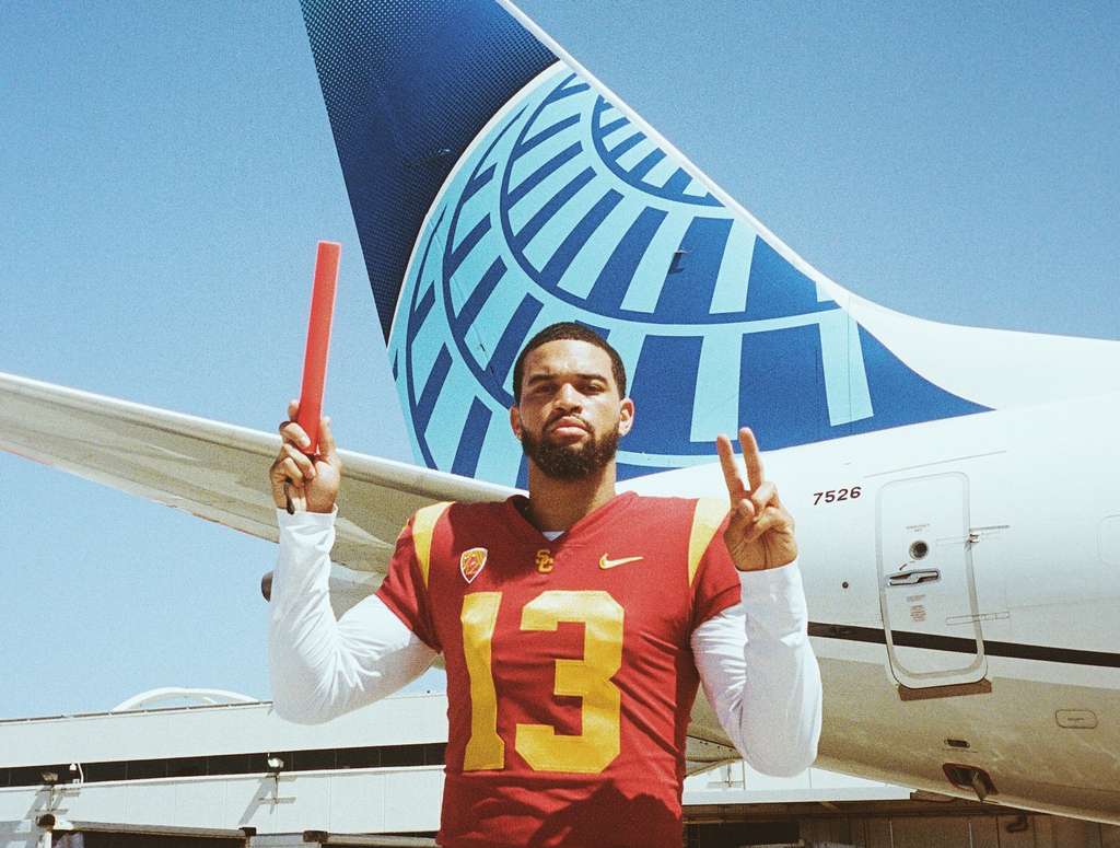 Trojans college football quarterback Caleb Williams with a United Airlines aircraft.