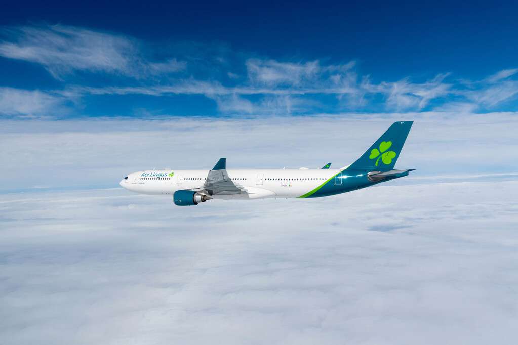 An Aer Lingus Airbus A330 in flight over cloud.