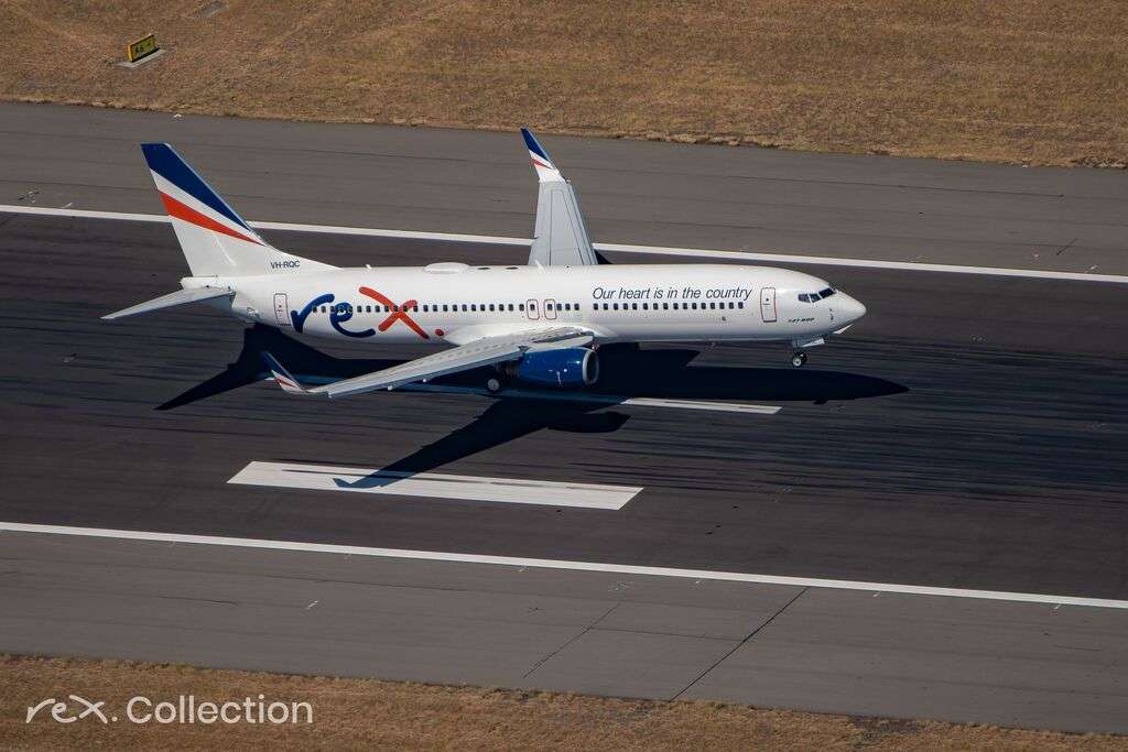 Aerial view of a Rex Airlines Boeing 737 taking off.