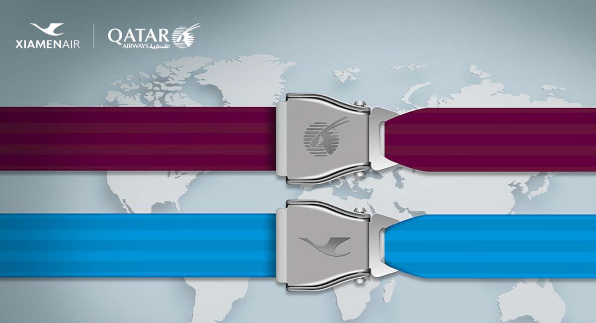 Two seat belt buckles with Xiamen Airlines and Qatar Airways logos.