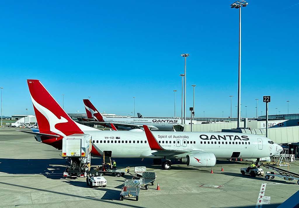 Qantas aircraft parked at domestic terminal.