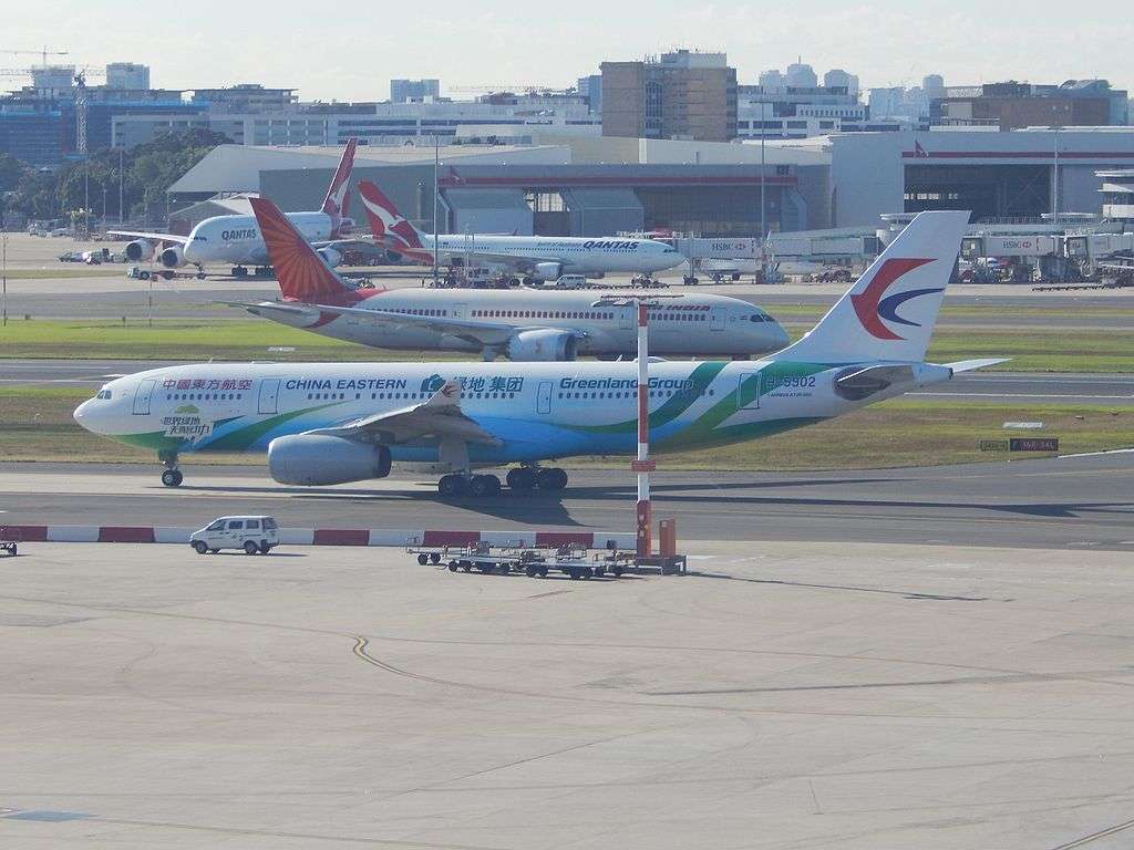 Qantas and China Eastern Airlines aircraft on the tarmac at Sydney.