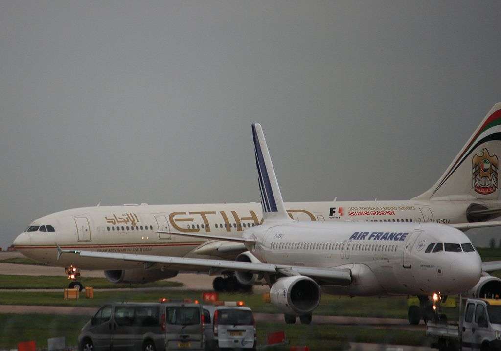 Air France and Etihad Airways jets on the taxiway.