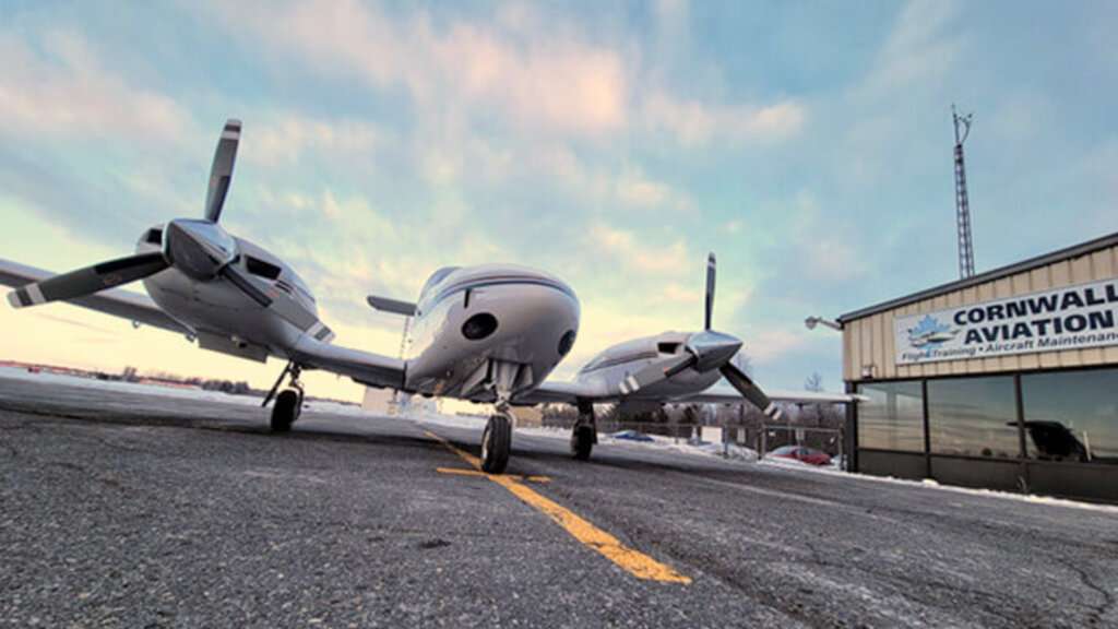 A light twin aircraft parked at Cornwall Regional Airport, Ontario