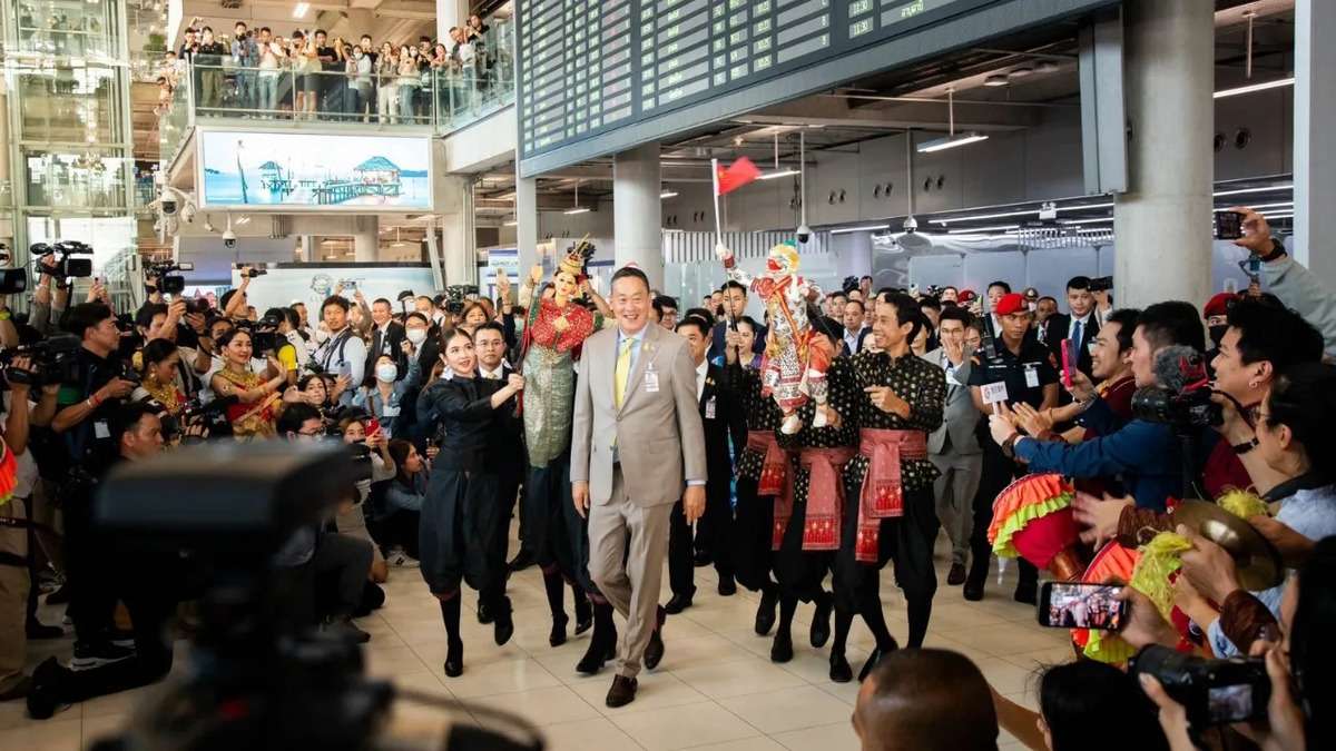 Thai PM welcomes tourists at Thailand Suvarnabhumi Airport.