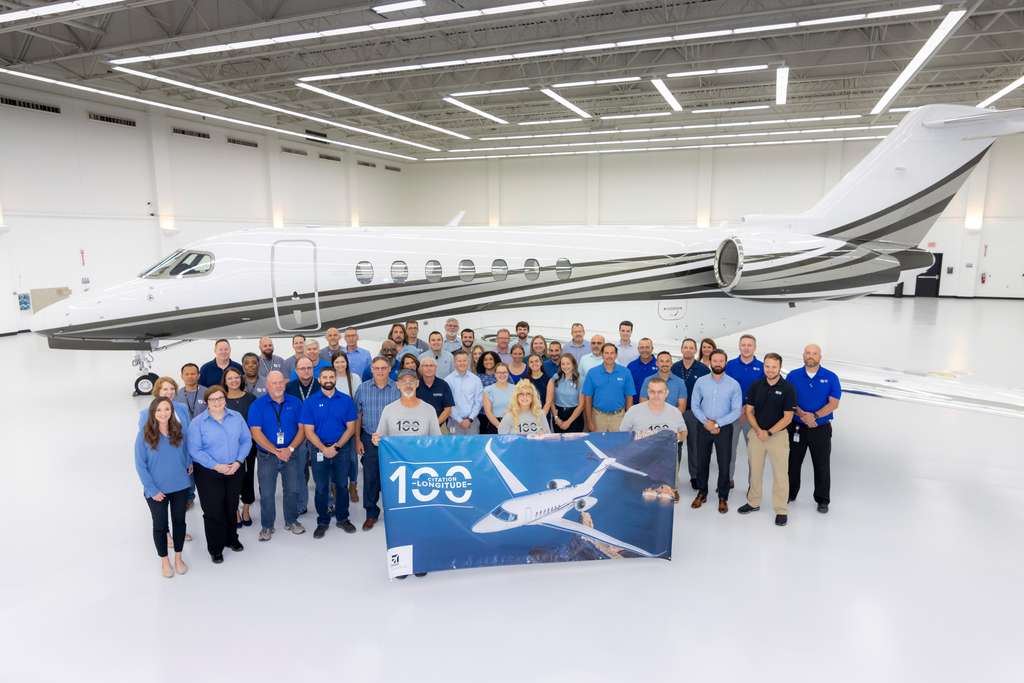 Textrom employees with 100th Cessna Citation Longitude jet.