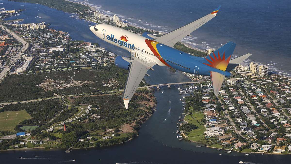 Aerial view of an Allegiant Airlines jet in flight.
