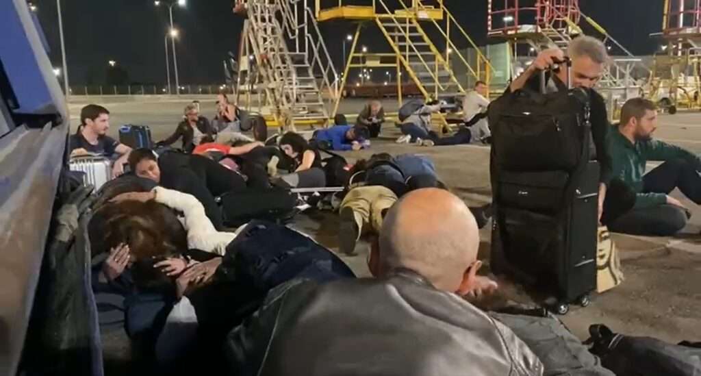 Passengers Take Cover Following Sirens at Tel Aviv Airport