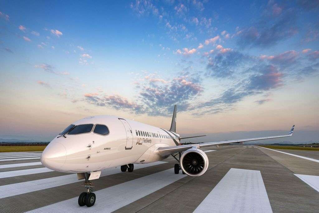 An ACJ TwoTwenty jet on the runway.