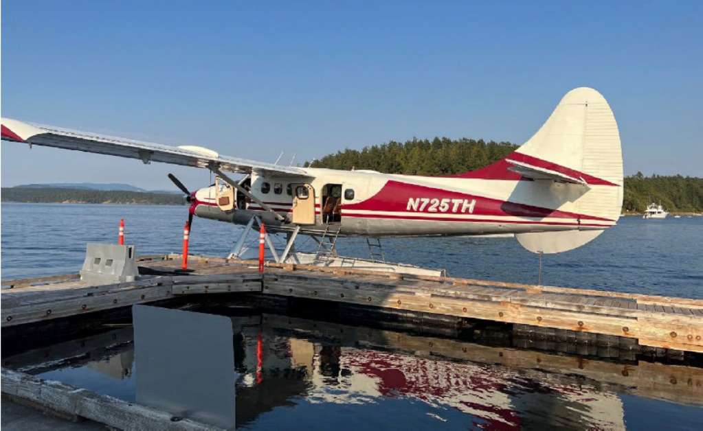 A DHC-3 floatplane at the dock in Mutiny Bay.