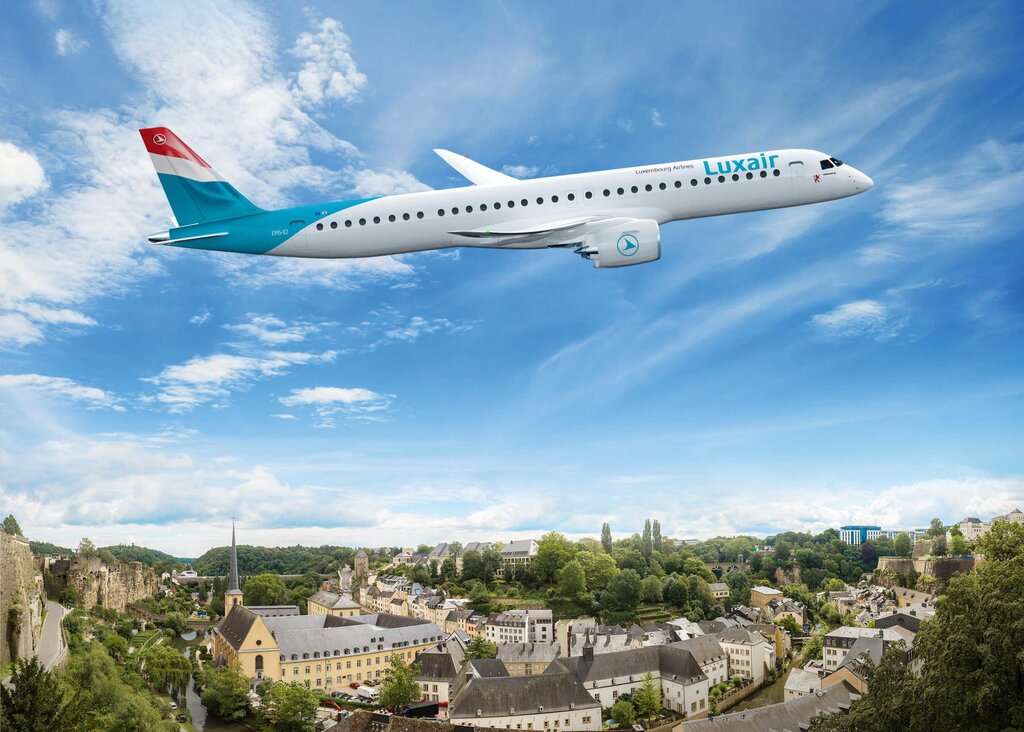 Render of a Luxair Embraer E195-E2 jet in flight.