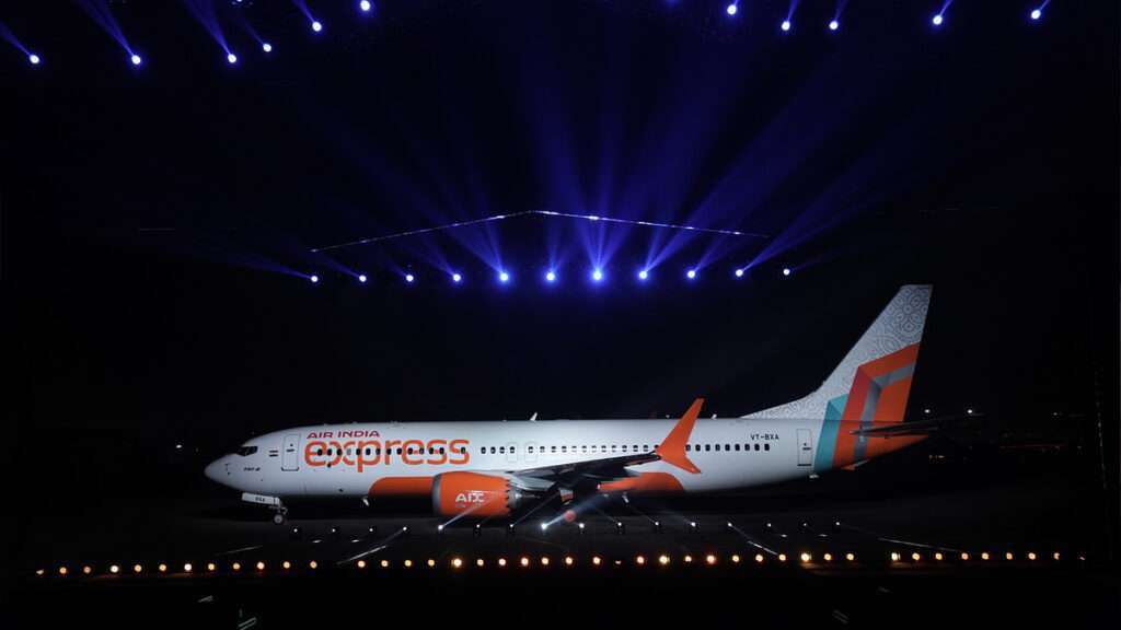 A newly repainted Air India Express aircraft is showcased.