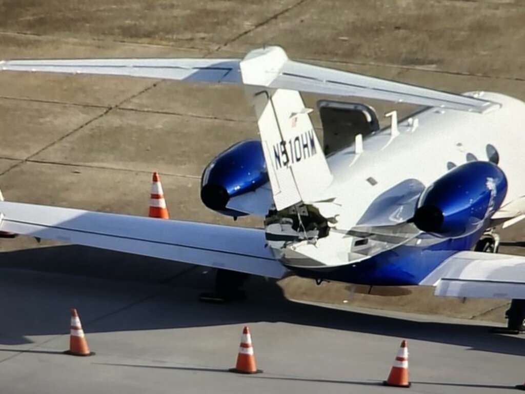 A damaged Cessna Citation jet at Houston William P. Hobby Airport.