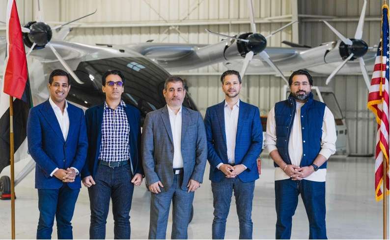 Archer Aviation and Abu Dhabi delegates with eVTOL Midnight air taxi aircraft