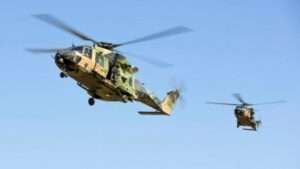 Two Australian Army MRH-90 Taipan helicopters in flight.