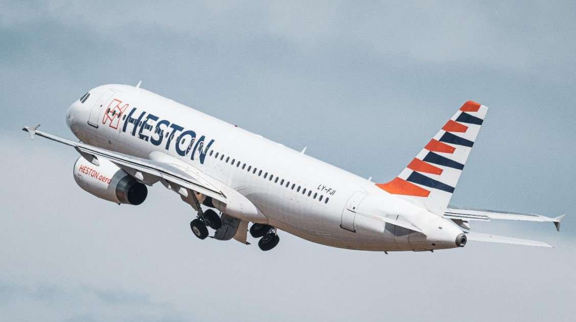 A Heston Airlines Airbus climbs after takeoff.