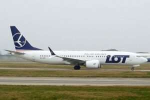 A LOT Polish Airlines 737 on the runway.