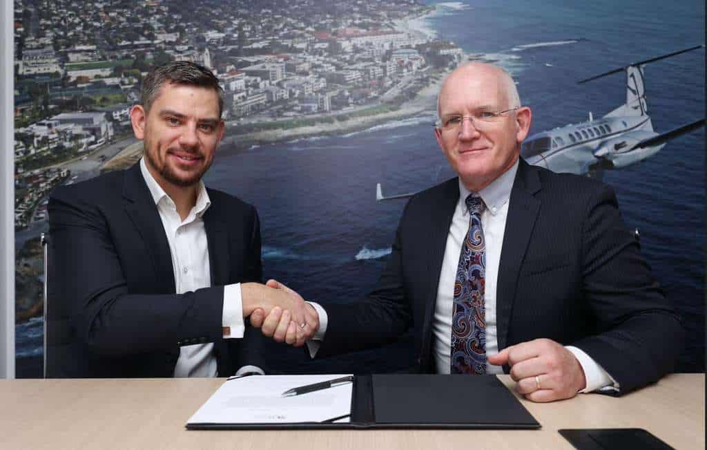 Officials of BAA Training and Textron sign agreement for Cessna Skyhawk aircraft.