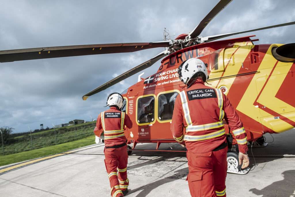 Cornwall Air Ambulance flight crew with AW169 helicopter.