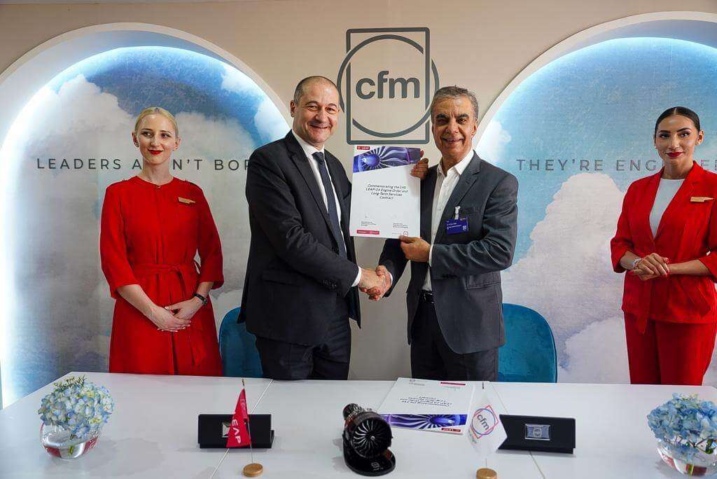 Air Arabia and CFM International executives with service order agreement.