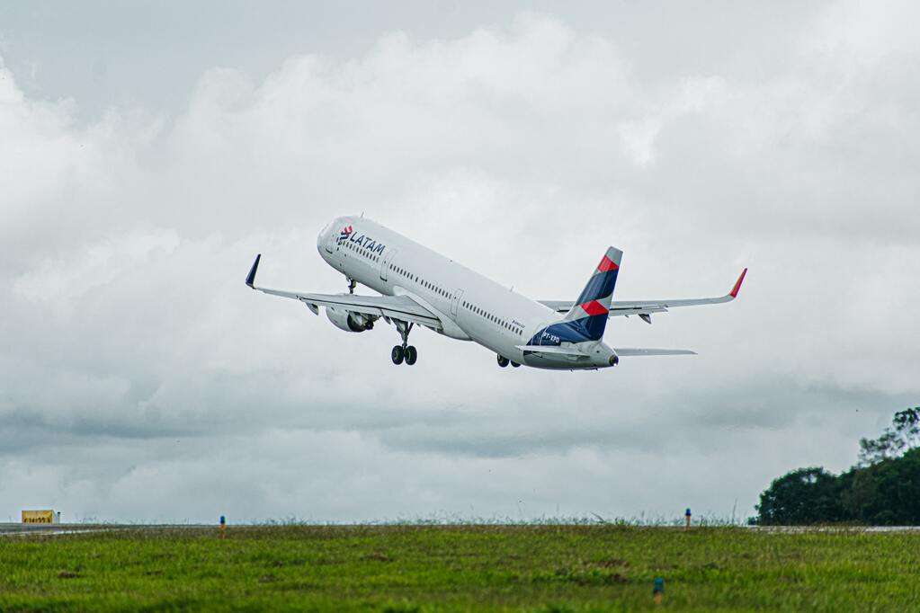 A LATAM Airlines Airbus A321 takes off.