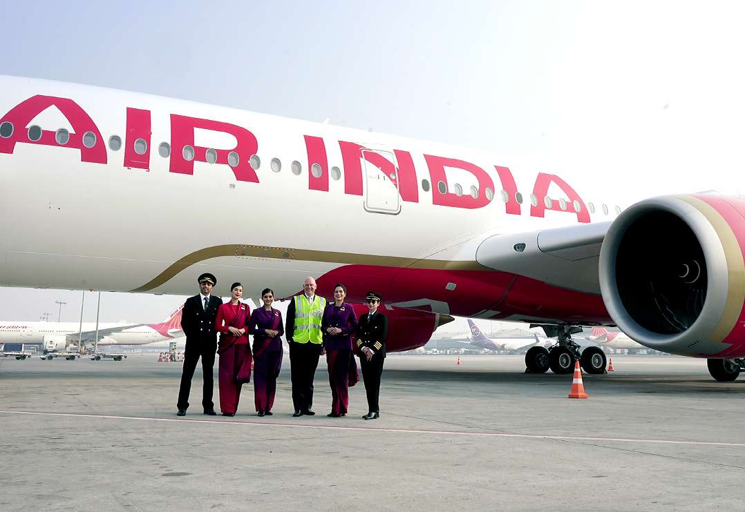 An Air India A350 and operating crew.