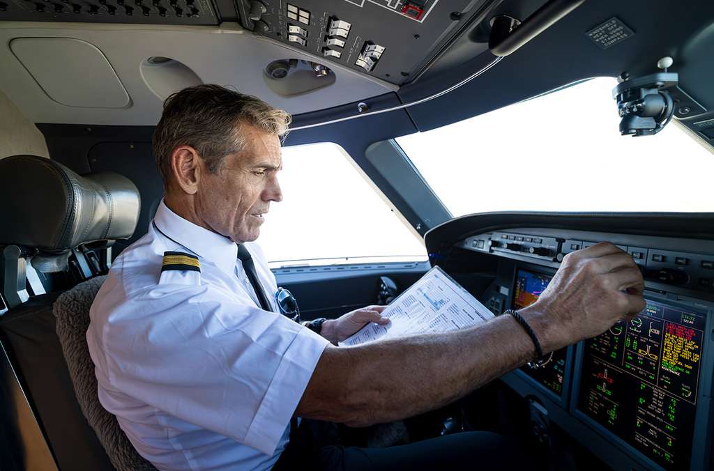 A pilot on the flight deck of an aircraft