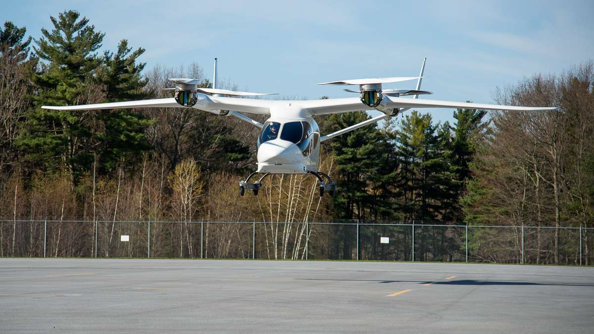 A BETA Technologies eVTOL aircraft hovers.