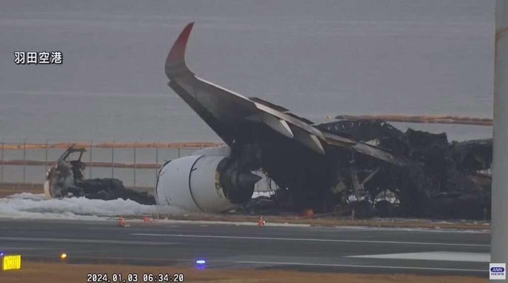 Burnt out wreckage of Japan Airlines A350 at Tokyo Haneda Airport.