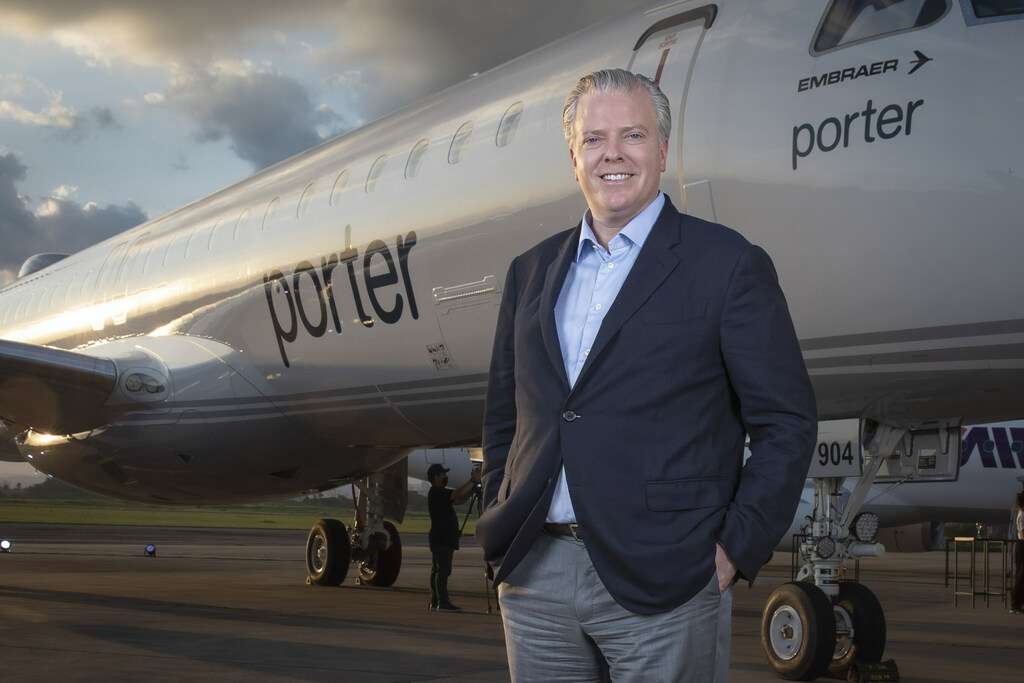 Porter Airlines CEO Michael Deluce with aircraft.