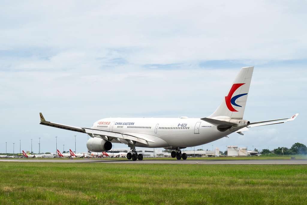 A China Eastern Airbus A330 lands at Cairns Airport.