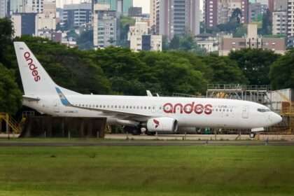 An Andes Boeing 737 lines up on the runway.