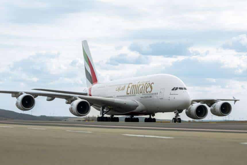 An Emirates A380 on the runway.