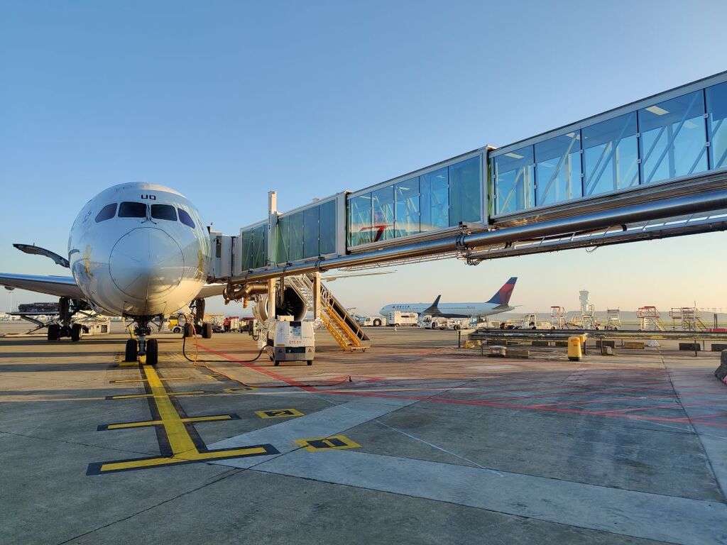 An aircraft at Brussels Airport terminal.