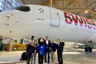 SWISS Airlines staff with A220 aircraft 'Nendaz'