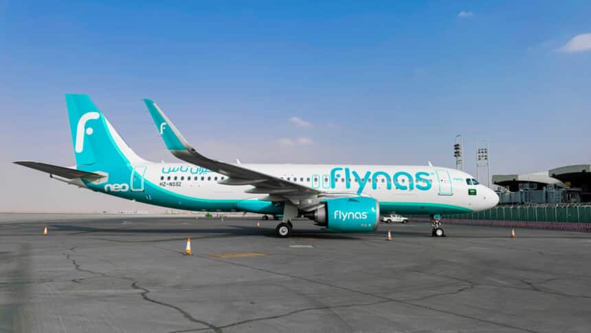 A flynas Airbus A320neo parked on the tarmac.