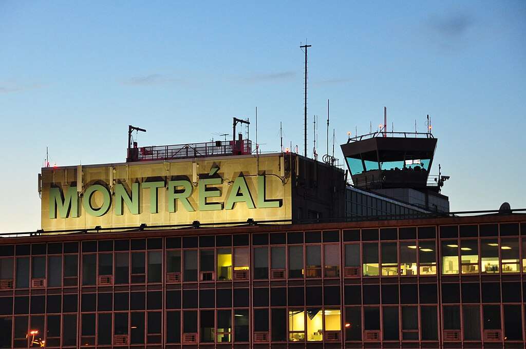 View of Montréal-Trudeau International Airport terminal and control tower.