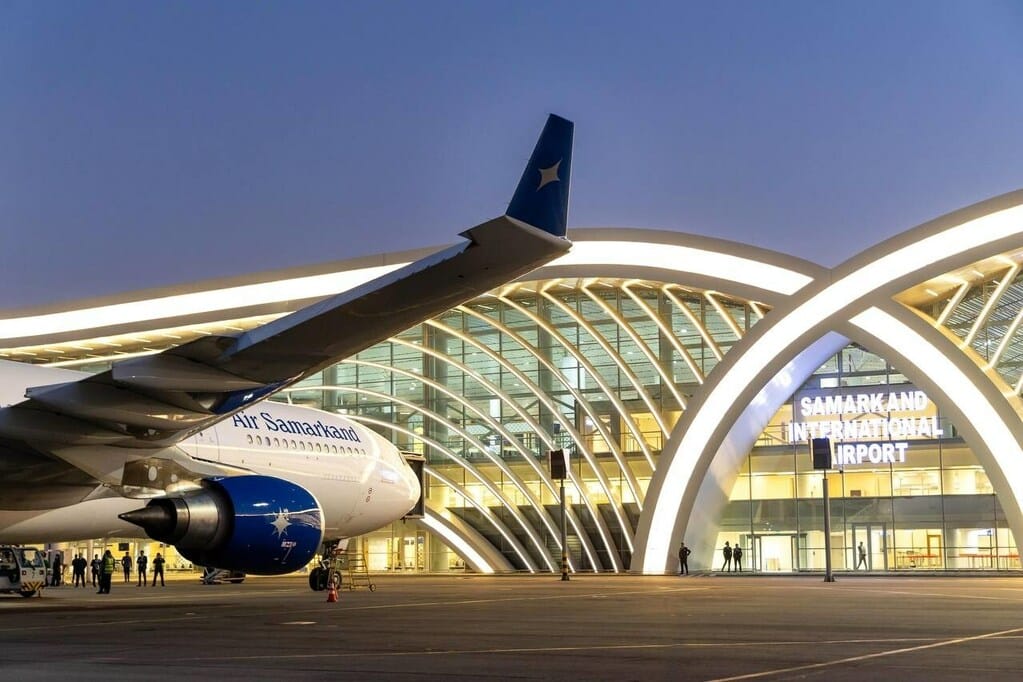 An Air Samarkand Airbus parked at the terminal.