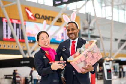 Qantas Customer Service Agen and Customer Service Manager with an Easter basket.