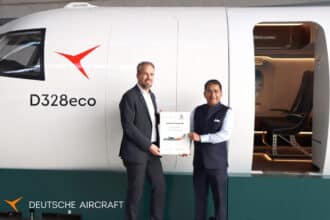 CEOs of Deutsche Aircraft and Dynamatic Technologies with D328eco aircraft.