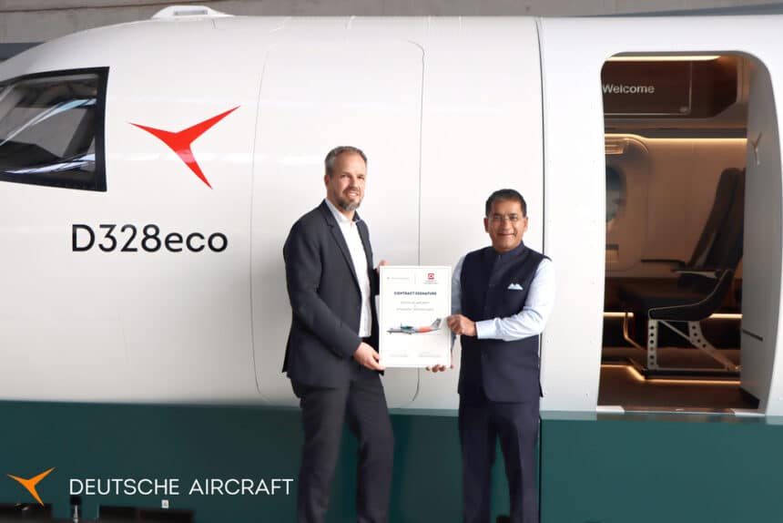 CEOs of Deutsche Aircraft and Dynamatic Technologies with D328eco aircraft.